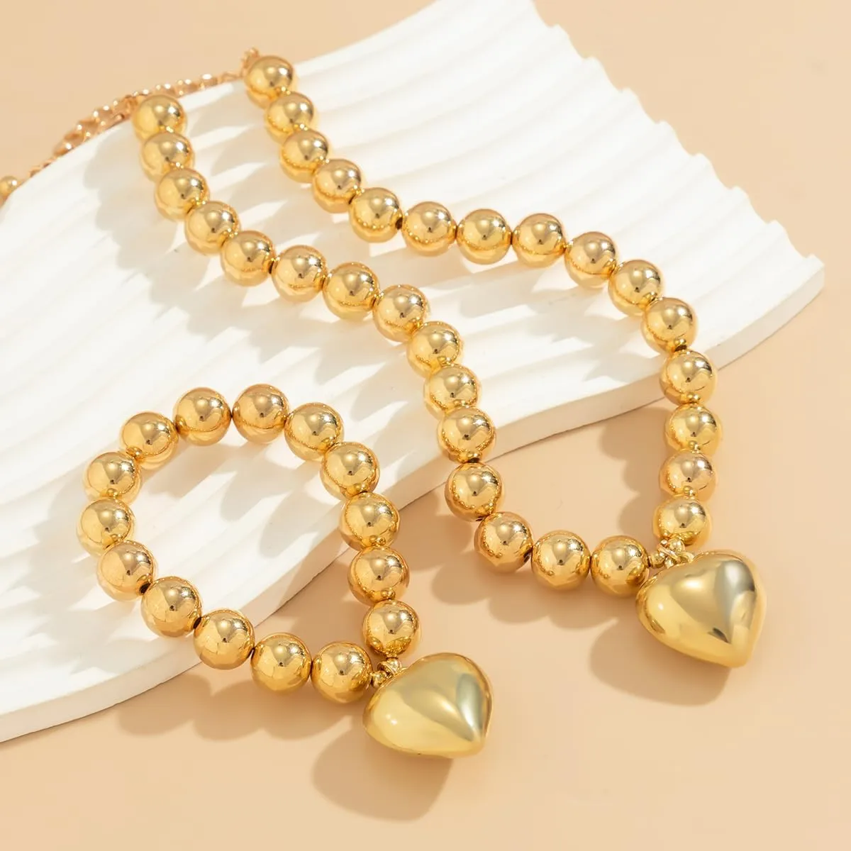 Salircon Chunky Gold Heart Choker Necklace and Bracelet Set With Big Pendant, Pearl Toggle, and Gold Beads