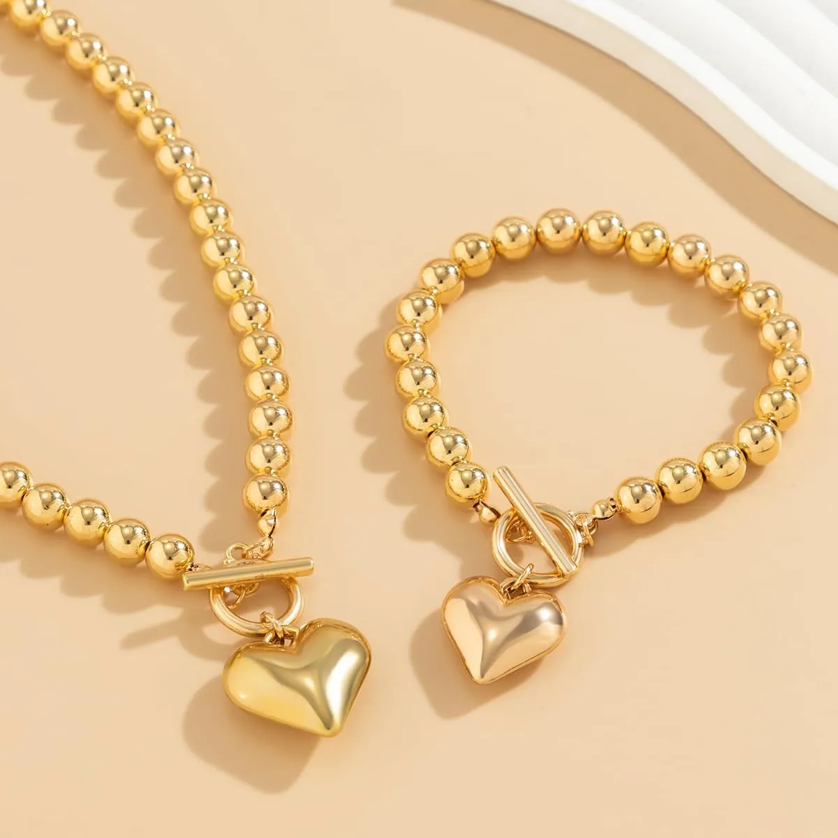 Salircon Chunky Gold Heart Choker Necklace and Bracelet Set With Big Pendant, Pearl Toggle, and Gold Beads