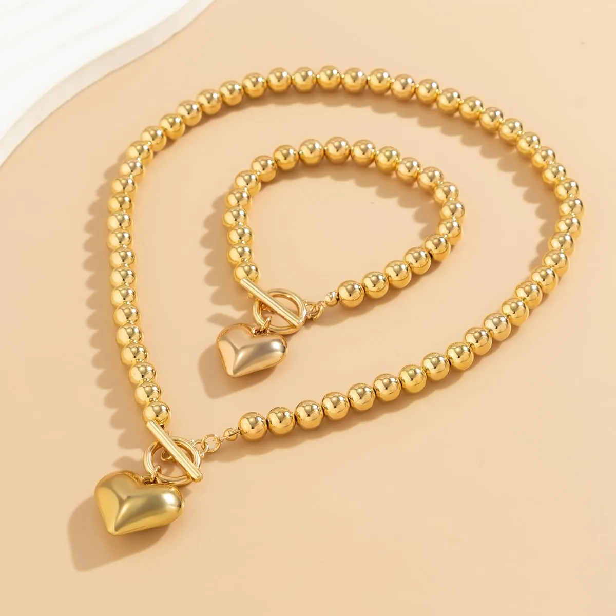 Salircon Chunky Gold Heart Choker Necklace and Bracelet Set With Big Pendant, Pearl Toggle, and Gold Beads